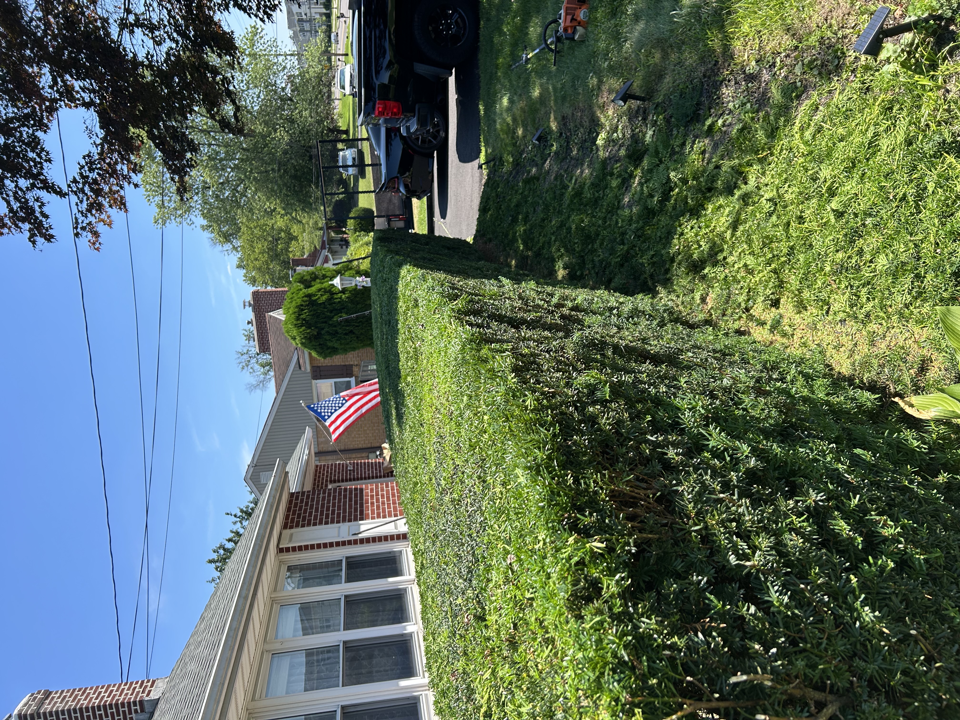 QQLC crew truck on-site at a residential property